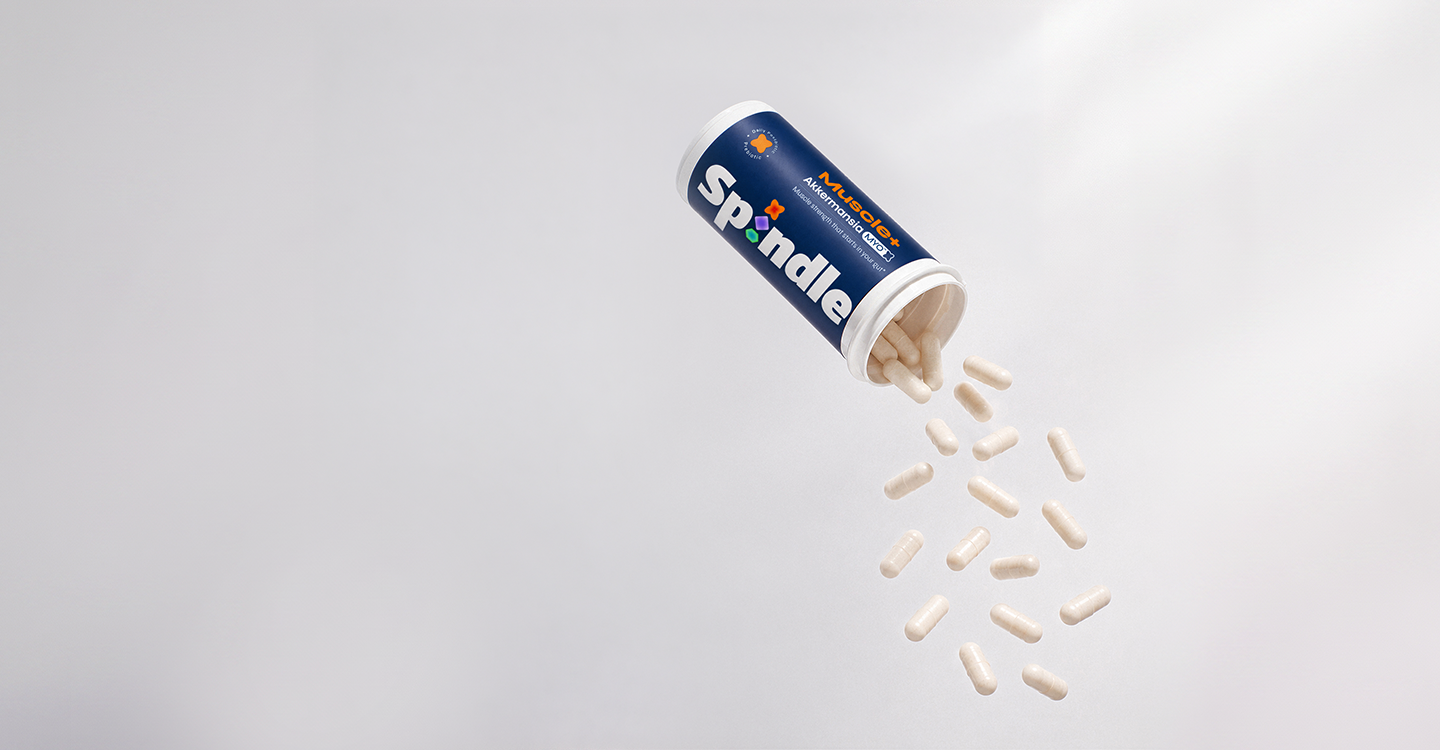 Spindle Muscle+ Pouring Pills Out of Bottle