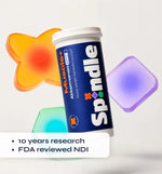 Spindle supplement container with colorful gel-like objects on a white background